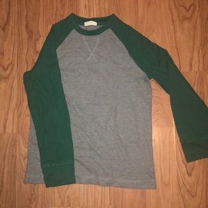Gray shirt with green long sleeves. Size M